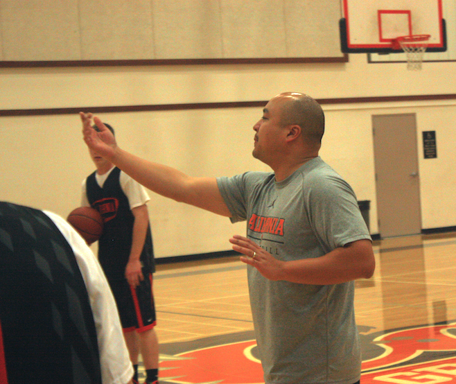 Math teacher takes on men’s basketball