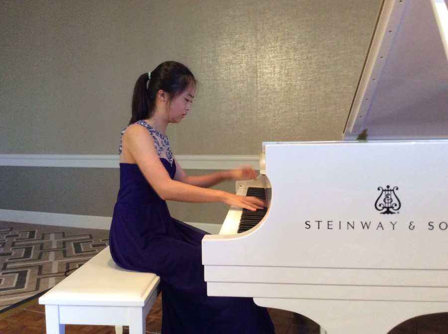 Minju Kim practices for hours on end, working toward her next achievement. She has received much acclaim for her talent, including playing at Carnegie Hall in New York City.