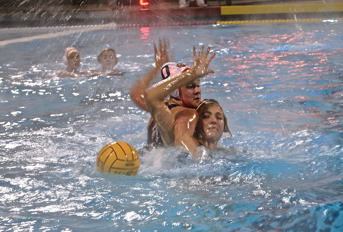 Junior+Taylor+Hammil%2C+left%2C+blocks+San+Ramon+Valley+High+School+player+in+NCS+semifinals.+The+women%E2%80%99s+water+polo+team%E2%80%99s+great+season+came+to+an+end+after+an+18-3+loss+in+this+game.+