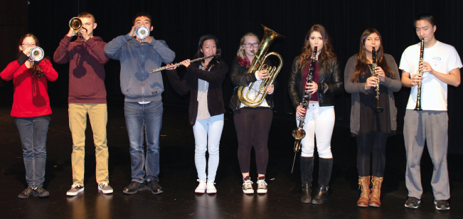 From left to right, senior Katelyn Hefter, freshman Kurt Krempel, senior James Taniguchi, junior Kristen Gao, sophomore Holly Mentink, junior Danielle Anderson, sophomore Karina Hazari, and senior Henry Sun are the eight Cal High students who will be performing with the Contra Costa Honor Band on Saturday.