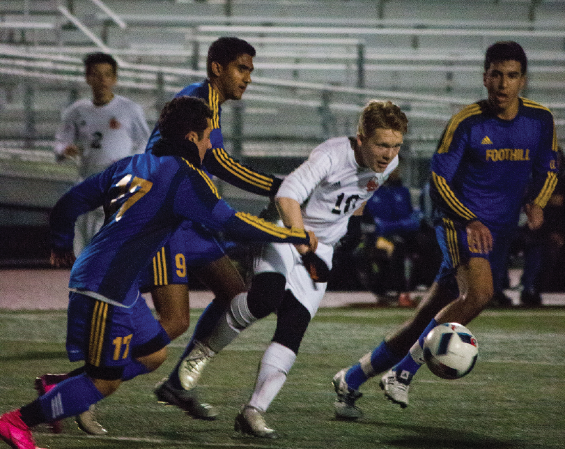 Senior Davis Bullock (10), pictured here playing against Foothill, is back at school and on the field after an arduous recovery from cancer. His last round of chemotherapy was on April 22, 2015, and he’s currently in remission.