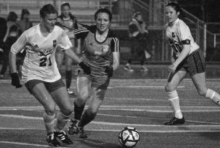 Junior Mary Swisher (21) defends the ball against an opponent in Cal’s 1-0 first round NCS win over Heritage High School.