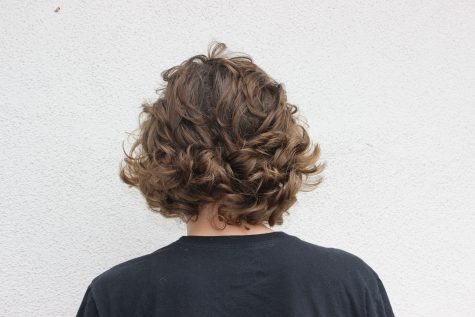 Walker Gaub shows off his unruly tendrils which bear a striking resemblance to washed up seaweed on the beach.