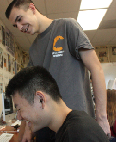 Above, former editors Austin Hille, standing, and Ryan Zhang collaborate on an issue of The Californian.