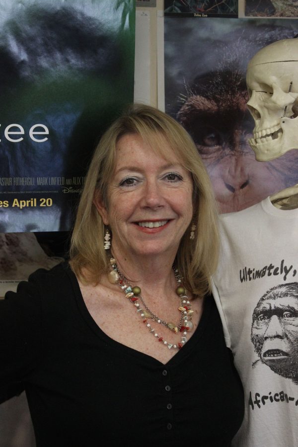 Biology teacher Julie Bitnoff, hanging with her skeleton friend, will remember her three-plus decades at Cal fondly. 