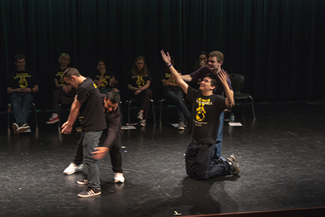Senior Colton Rettig and junior Kevin Sablinsky let audience members move their bodies while playing the improv game Moving Bodies. 