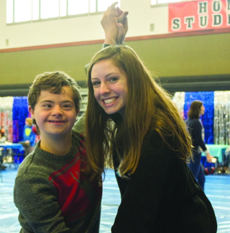 Christian, left, and Kinsey dance with each other at Winter Wonderland on Dec. 2. Both students are from other schools, but participated in the dance at Cal High.
