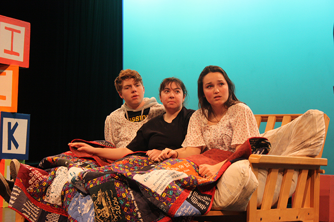 From left to right, play production students Kieran O’Connor and Hannah Chylinski, both seniors, and junior Jillian Weber rehearse “Baby with the Bathwater,” which opens Thursday night.