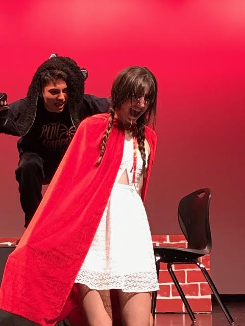 Senior River Moore and sophomore Zoe Whitaker in their roles as The Wolf and Little Red Riding Hood.