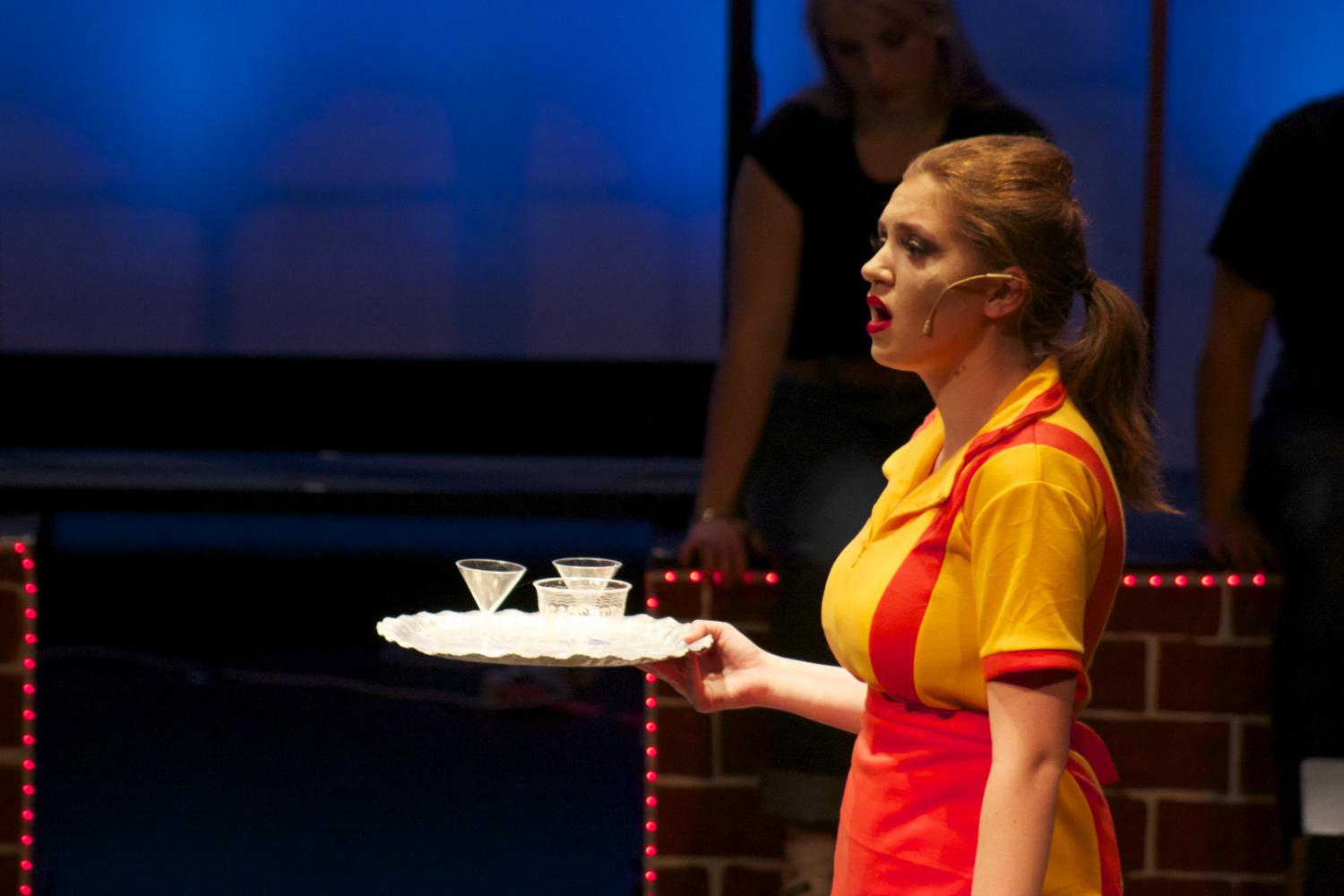 Sophomore Claire O’Connor in “It’s an Art” in her role as a spunky Italian waitress struggling to get by.  Many students sang solos about the working class. “Working” ran through from April 27-April 29.