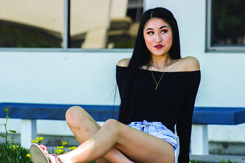 Junior Kianna Ferrer shows off her trendy summer outfit.