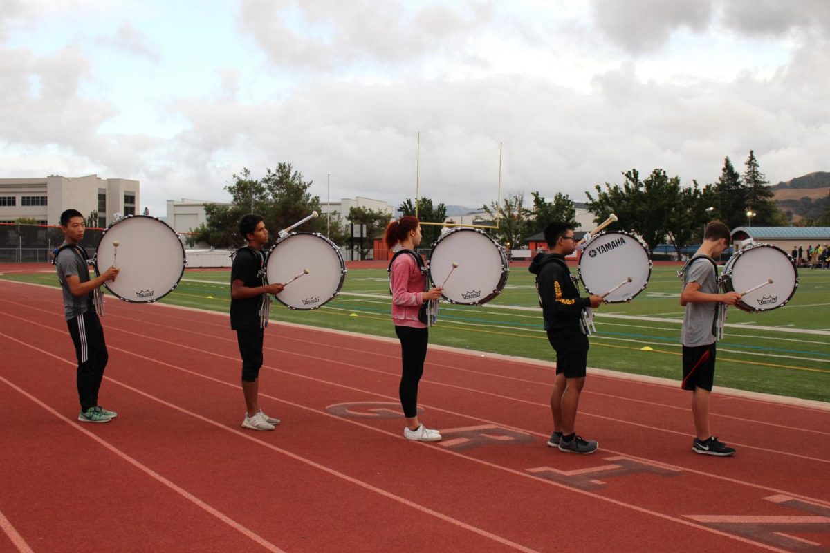 Cal High’s marching band drummers practice in formation for the upcoming performances of the year.