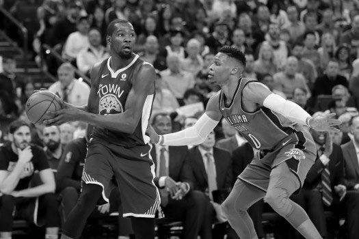Golden State Warriors' Kevin Durant (35) looks to pass against tOklahoma City Thunder's Russell Westbrook (0) in the first half of an NBA game at Oracle Arena in Oakland, Calif., on Tuesday, Feb. 6, 2018. (Ray Chavez/Bay Area News Group)