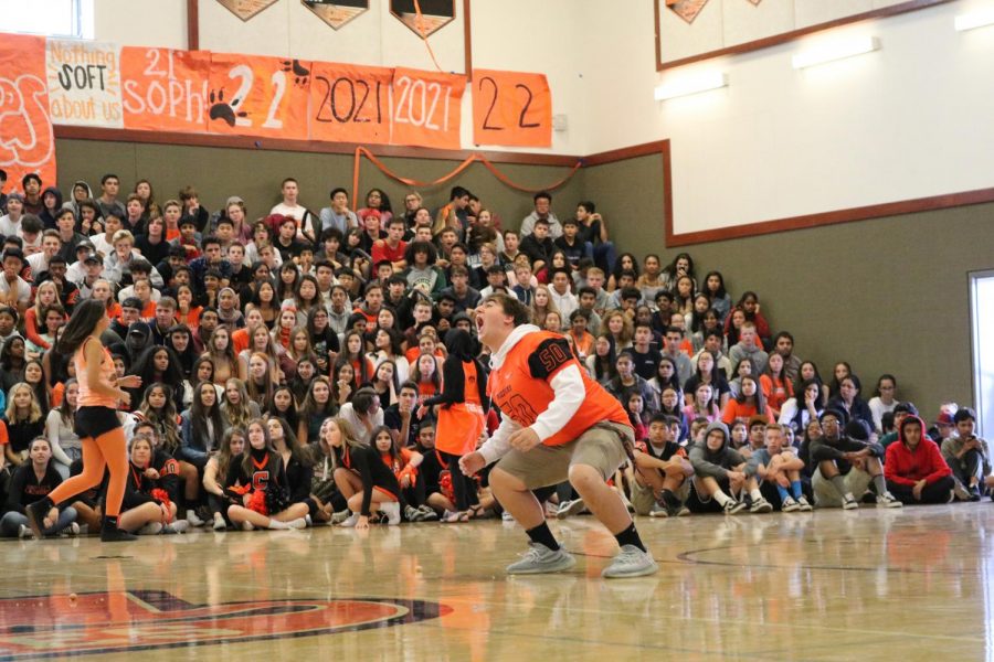 Junior Emanuele Manzone catches a donut in his mouth, but fails to catch the attention of the crowd.
