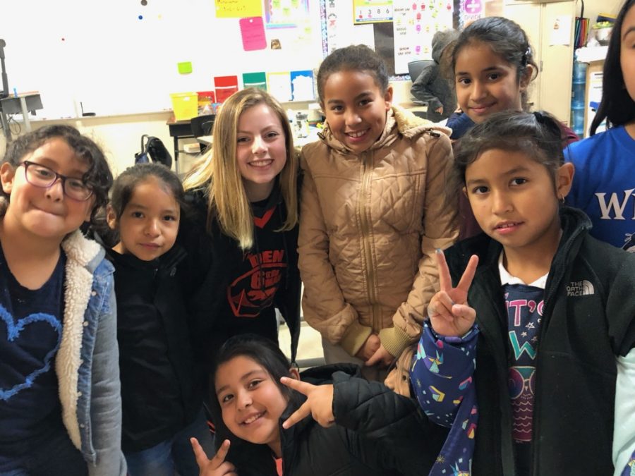 Cal High leadership student Alex Messich, third from the left, poses with students at Wilson Elementary School