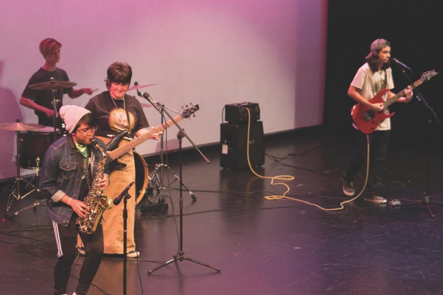 From left to right: Garrett Grant, Brandon Amor, Daly Grant and Eddy Cordero perform at Night at the Apollo, one of many Leadership Legacy Projects this year.