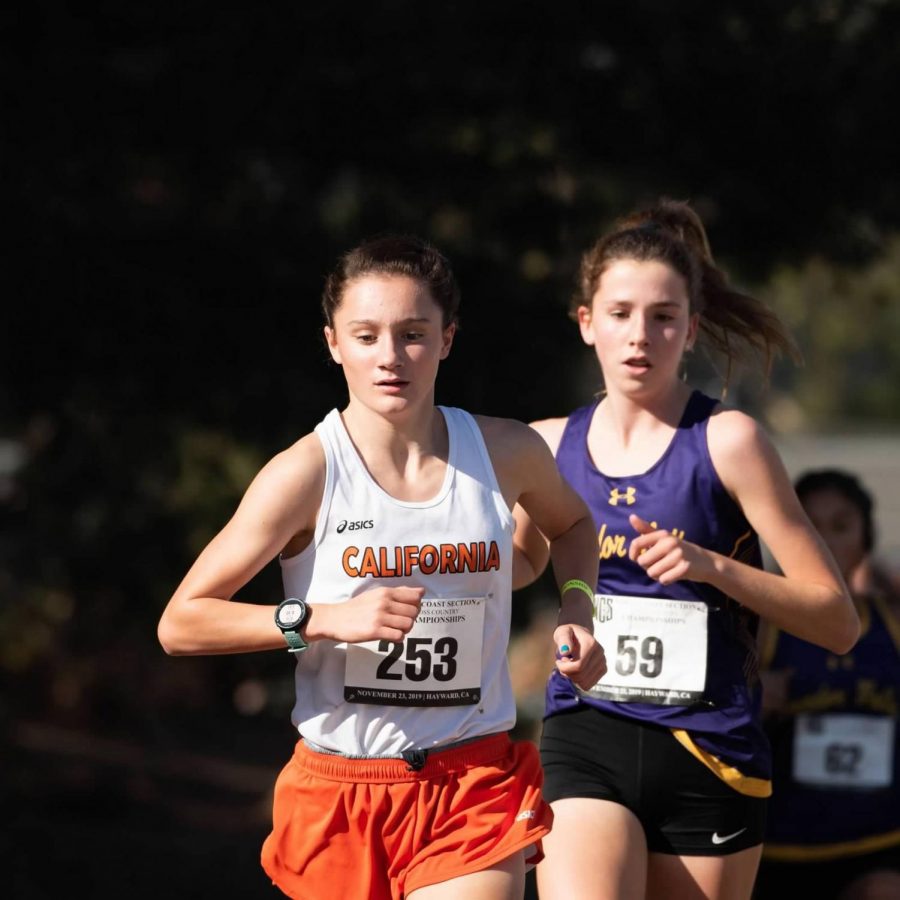 Sophomore+Madison+Chavez%2C+left%2C+ran+the+seventh+best+time+in+Cals+history+when+she+posted+a+time+of+18%3A52+in+the+five+kilometer+race+at+the+CIF+State+Championships+on+Nov.+30