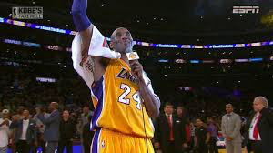 Kobe Bryant bids farewell to Laker fans after his last NBA game.