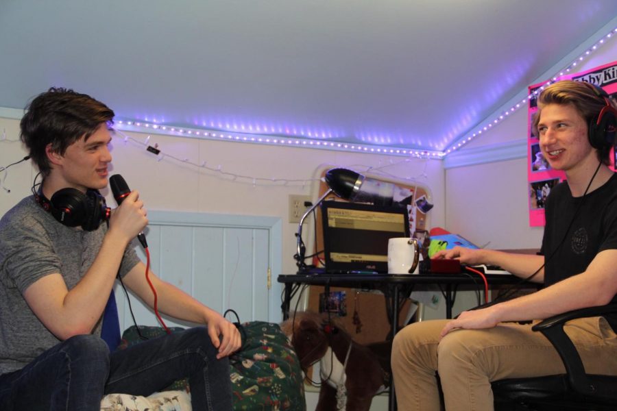 Junior Gavin Preisser, left, and senior Cameron King, right, record a Pixar podcast discussion in King’s iconic attic. King’s Attic Antics started earlier this school year, and has 48 podcasts that are available on Spotify.