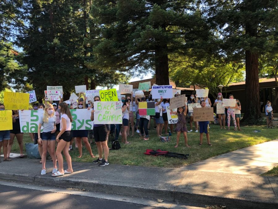 A group of SRVUSD parents and students sat outside of the district office on June 23 to protest.