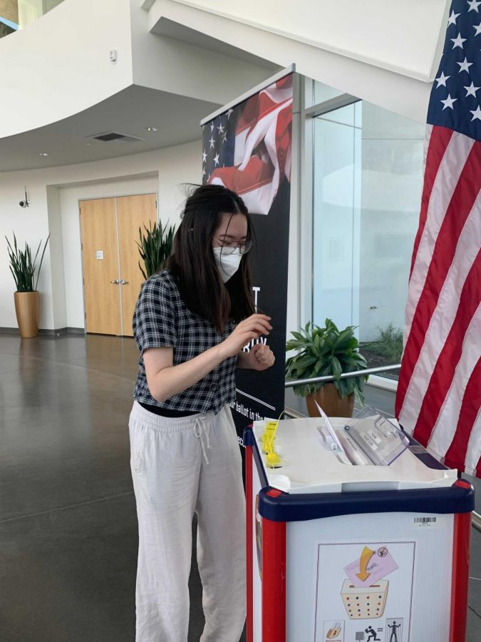 Cal High senior Kimi Shirai drops off her ballot at the dropbox inside San Ramon City Hall. Shirai is among the many Cal students participating in this years election by either voting or volunteering.