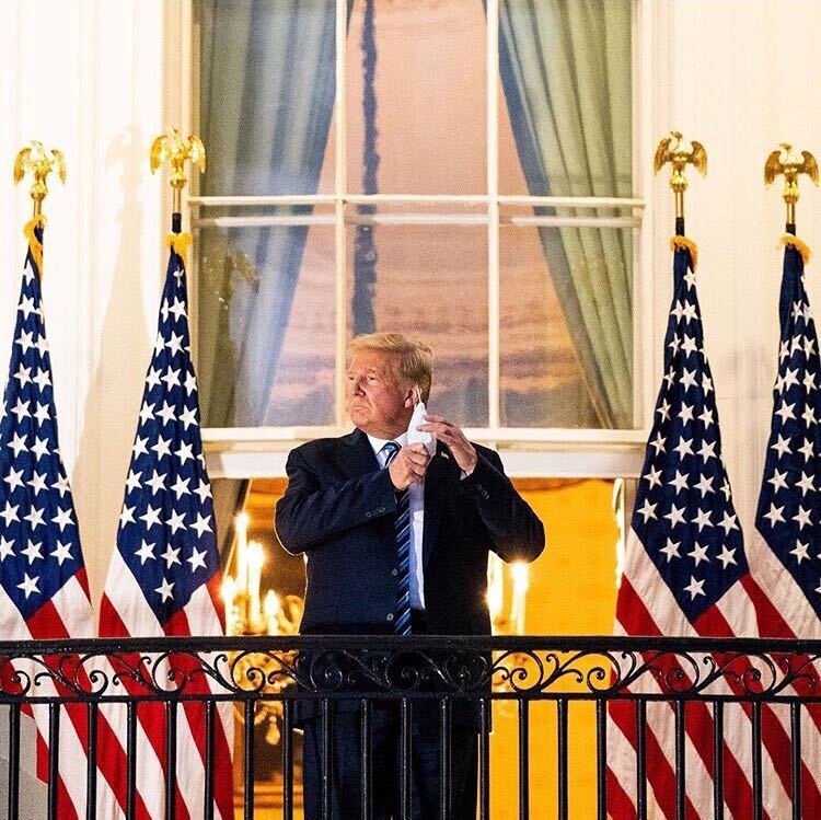 President Trump removing his mask in front of cameras on the White House balcony three days after being diagnosed with COVID-19.