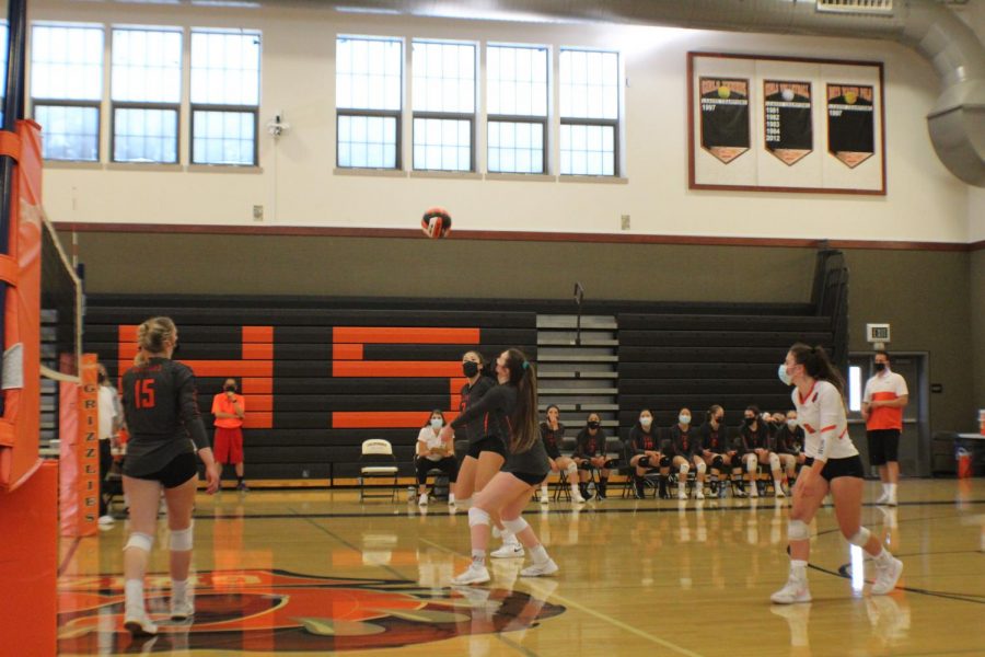 New district guidelines for athletes and coaches now require only members of indoor sports, such as the girls volleyball team, to provide proof of vaccination or submit to twice-weekly COVID 19 tests. The district initially indicated that all athletes must follow these guidelines.