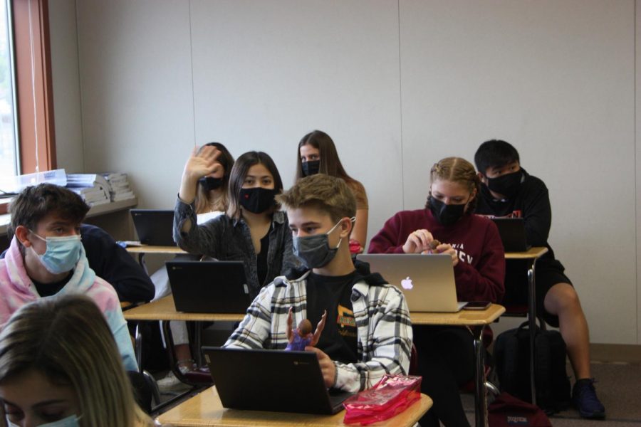 Students in Mr. Allen’s class do work while wearing masks, which is a requirement of everyone on campus while they are indoors. Masks are reinforced in all classes as a precaution against COVID-19.