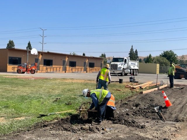Workers built a path from the back parking lot to the portables early in the school year. The portables are still not being used because Cal's enrollment is lower than what was projected.