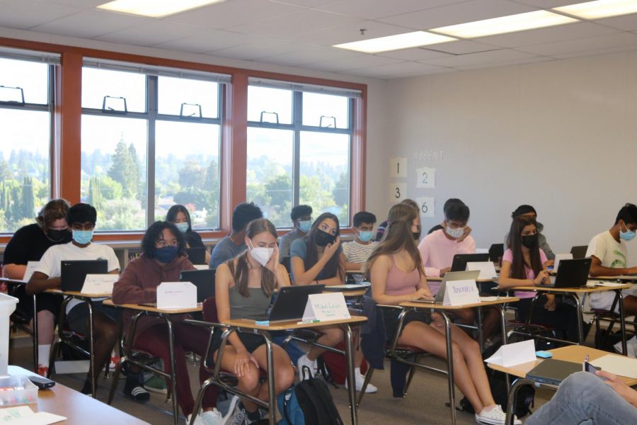 Students work on their Chromebooks, which were provided by the school district this year for the first time.