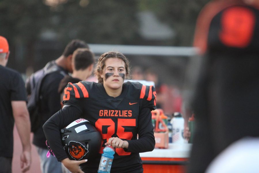 Senior Vicky Coninck, number 85, watching her team compete in the first home game of the year against Antioch.