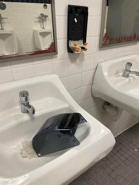 Left, a soap dispenser in the third floor boy’s bathroom is one of many that have been destroyed by students following the “Devious Licks” TikTok trend. Several bathrooms have been closed on campus because of vandalism.