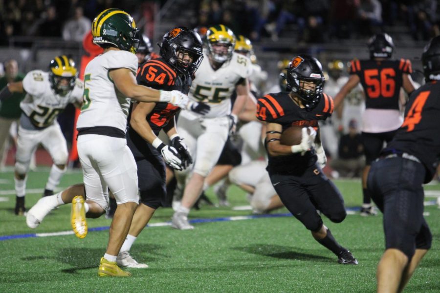 Running back Devan Love (24) carries the ball against San Ramon Valley High during Cal’s 31-20 loss at home on Oct 29.