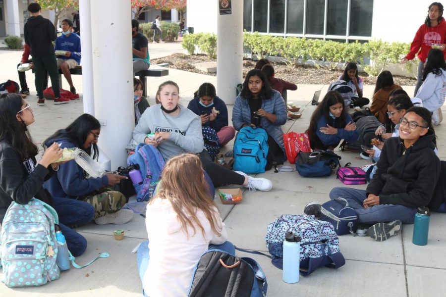 Cal High students enjoy eating  lunch outside in the quad during nice weather. When it gets too cold and starts raining, administrators told students they would be allowed to eat inside the main building despite the mask mandate indoors.