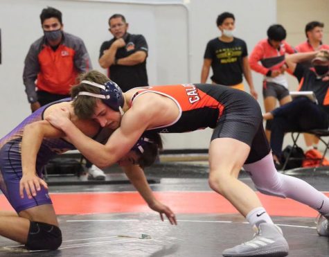 Zack Innamorati, right, takes control of his opponent during a recent Cal High wrestling meet.