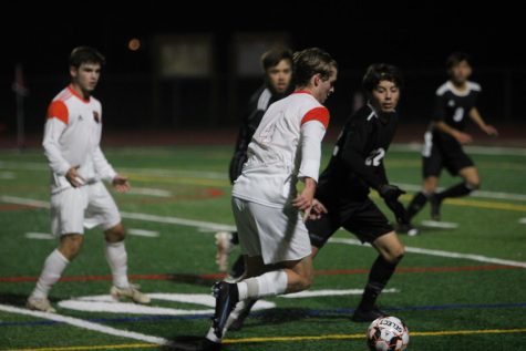 Derek OBrien dribbles up field with the ball for the Grizzlies, who are off to a 3-1-3 start.