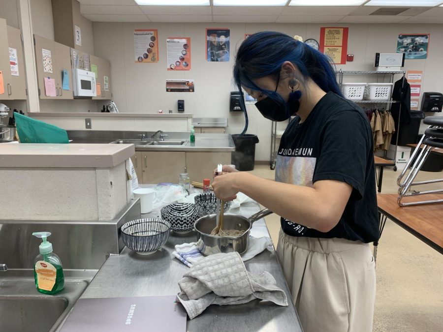 Junior Daphne So prepares one of her dishes during Cal Highs MasterChef, a three-day student cooking competition.