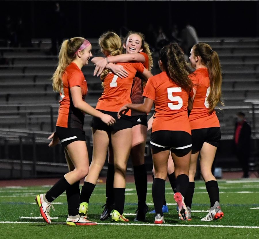 The women’s soccer team celebrates. They were able to do that a lot this season on the way  to the NCS championship game.