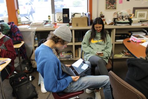 Students spend support time doing last minute work on their phones and other activities.