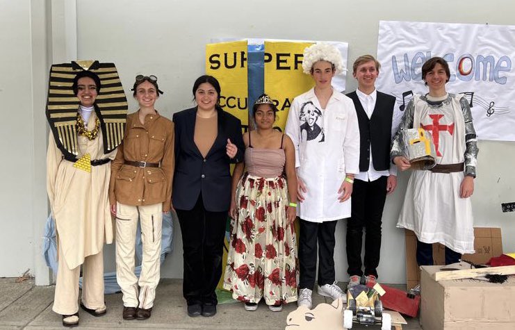 From left to right, Sriya Burra, Sasha Karelina, Safoora Nabi, Arpita Gupta, Paul Iancu, Alex Siladie and Sebastian Sandru pose in their Odyssey of the Mind costumes.  