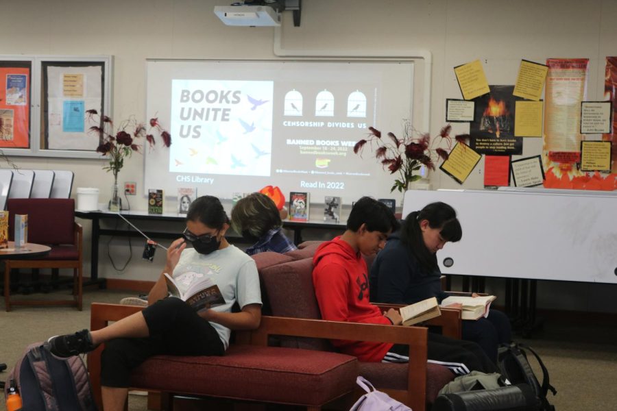 Students read books that have been challenged during a celebration of Banned Books Week.