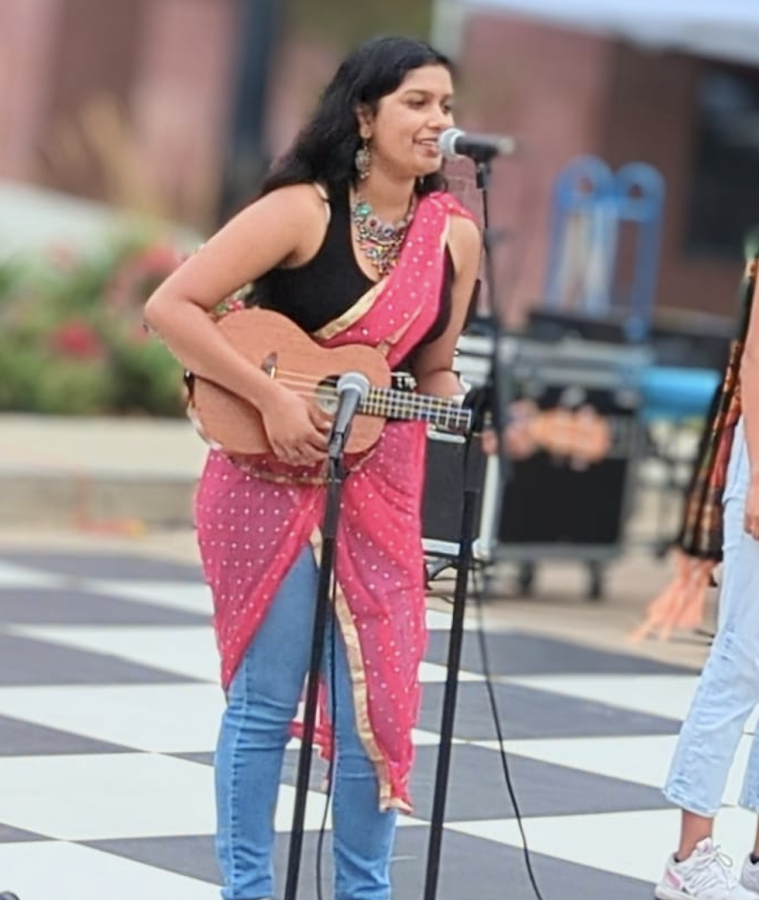 Junior Shivali Pathak sings and plays her ukelele with the Tri-Valley Youth Music Group.