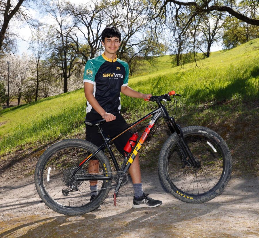 Cal High junior Kaartik Tejwani stands with his BMX bike. Tejwani, who has been riding for three years, plans to restore the BMX track at Memorial Park early next year.