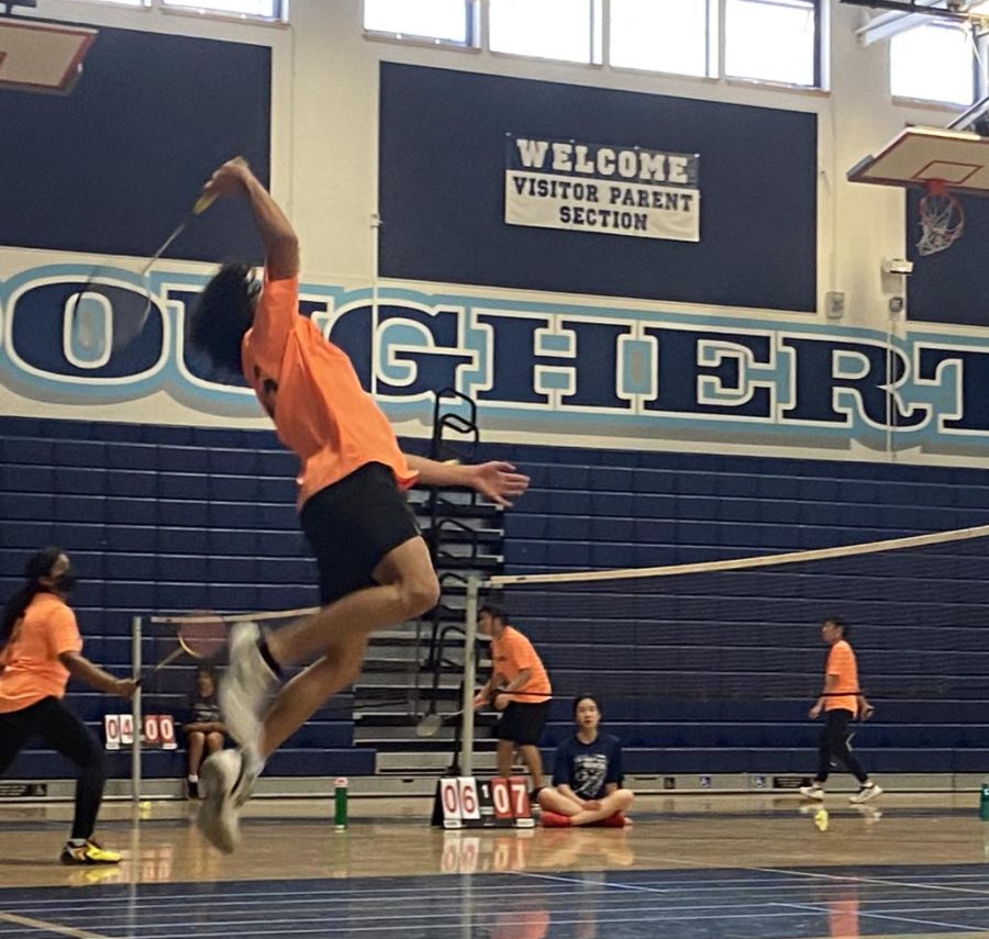 Yves Homayoon jumps to hit the birdie during a game for Cal High. The sophomore is No. 45th ranked badminton player in the US National Junior singles ranking for 17 and under.