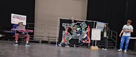 From left to right, Jordan Vereen, Anika Choudhary, Andrew Ma, June Kim, and Lance Shilling perform at the state competition in Brentwood on March 25. Choudhary, a main character is fighting with her mom in the center of the stage.