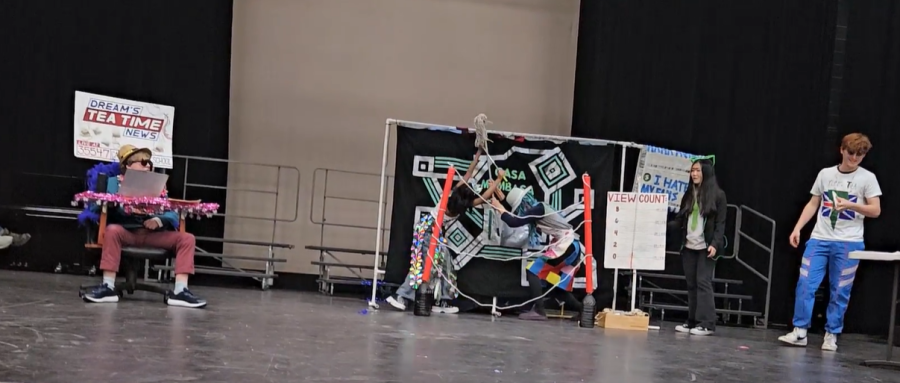 From left to right, Jordan Vereen, Anika Choudhary, Andrew Ma, June Kim, and Lance Shilling perform at the state competition in Brentwood on March 25. Choudhary, a main character is fighting with her mom in the center of the stage.