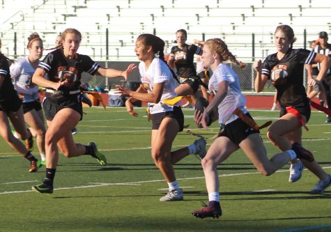 Last Year, junior and senior girls play in the annual powderpuff football game.  Now that the CIF has added flag football to the fall schedule in August, girls will be able to play the sport competitively against other EBAL schools.  