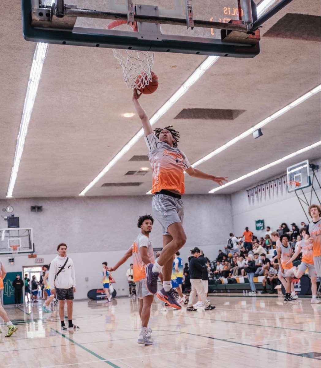 Kellen Torrey goes up for a layup while warming up for the 2023 “Simply Basketball: Battle of the Bay” game. 