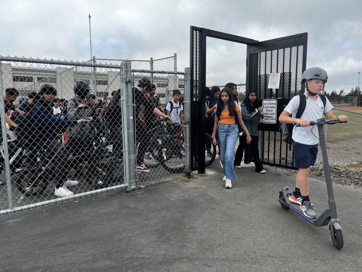 Cal High students leave campus through the newly installed gate on a path that leads to the Iron Horse Trail.