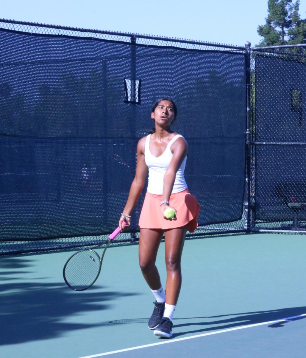 Freshman Sachika Kamath gets ready to serve during a match for Cal this season. Kamath is 3-0 for the Grizzlies. 